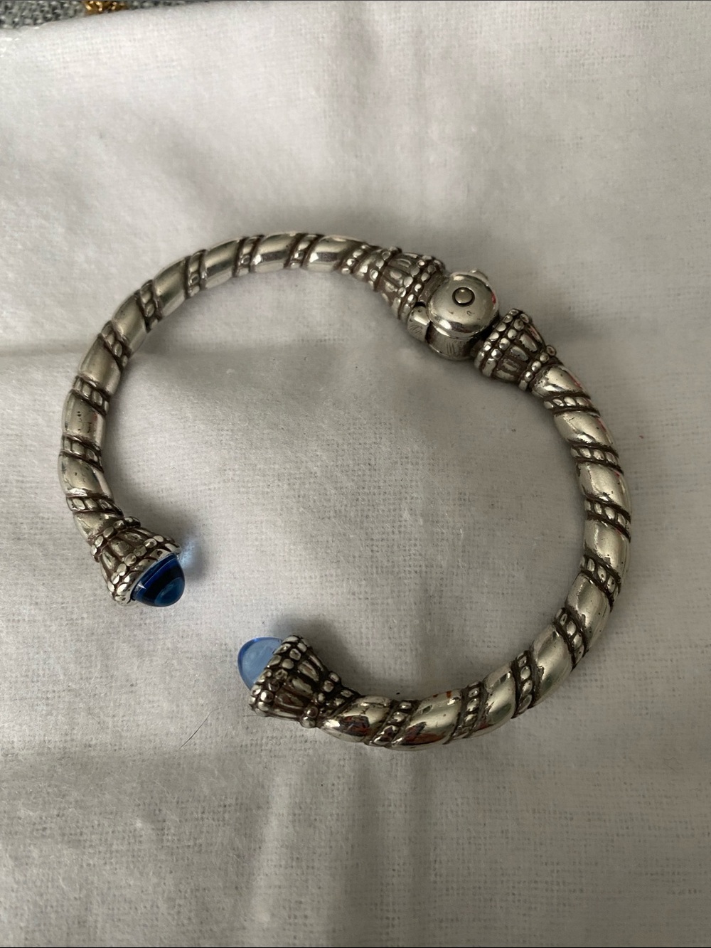 Sterling-Tone Twisted Cuff Bracelet with Blue Accent Tips